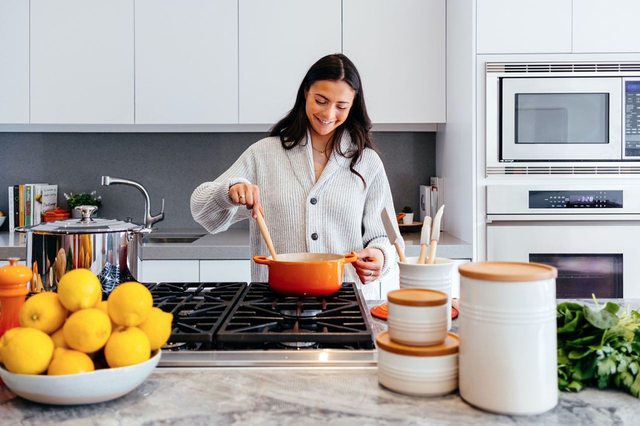 woman cooking in kitchen