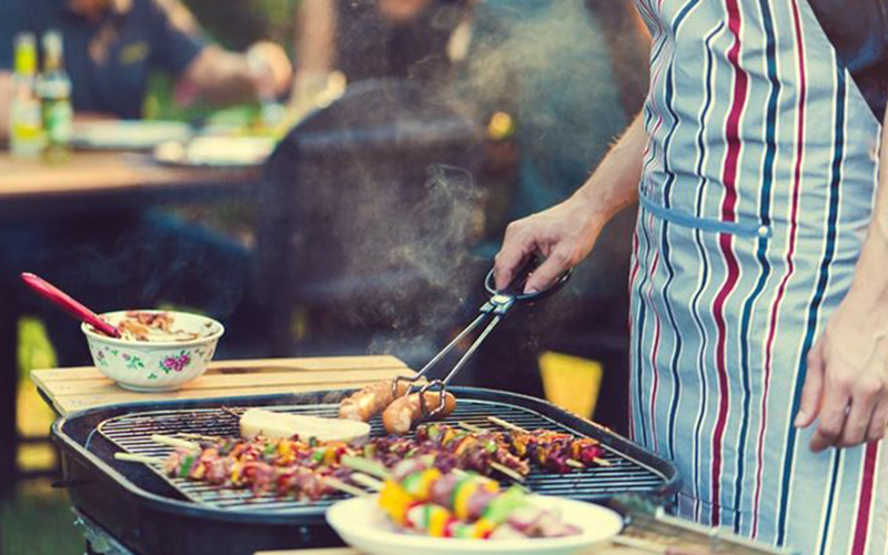 man barbequing