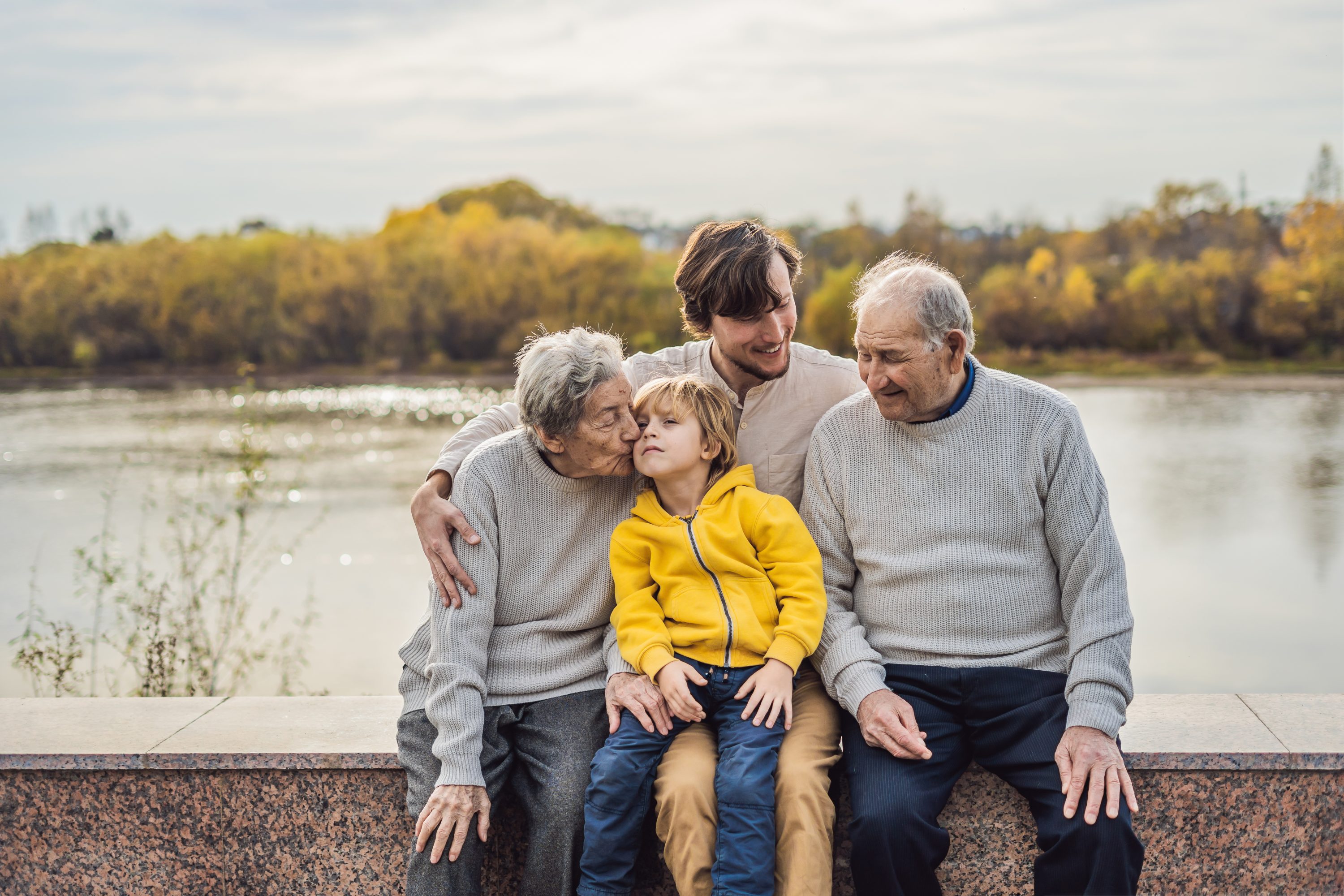 family by the water